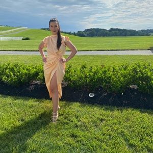 Beautiful peach dress. Perfect for wedding guest! I got so many compliments.